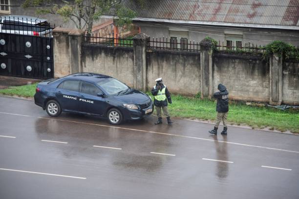 african traffic police on the street - daily cruiser imagens e fotografias de stock