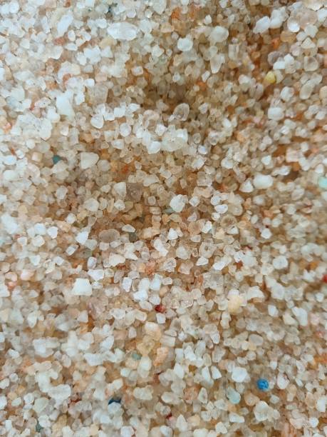 Beige salt granules stock photo