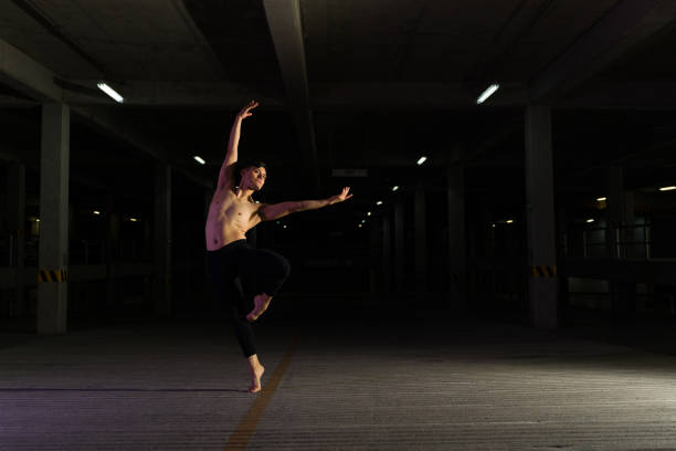 istock Handsome talented street dancer dancing in the parking lot 1503412424
