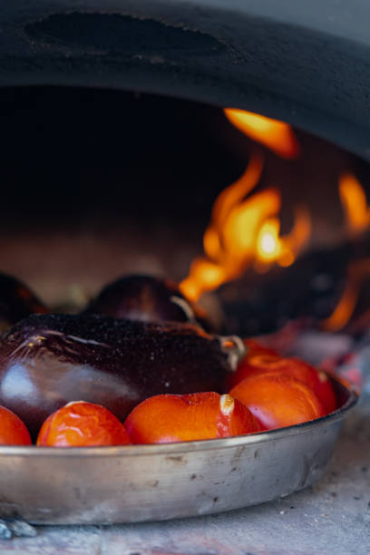 istock Eggplant and Tomatoes Cooked in a Traditional Stone Oven 1503422513