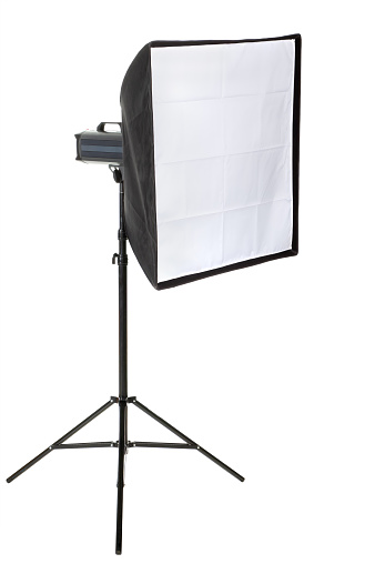 studio flash with softbox isolated on the white background