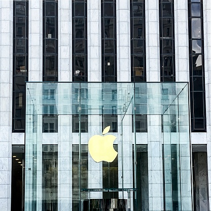 New York, NY, USA - June 28 2023: Apple logo at entrance to the Apple Store at 767 Fifth Avenue, Manhattan, NYC. This store, near Central Park, is popular with both tourists and New Yorkers.