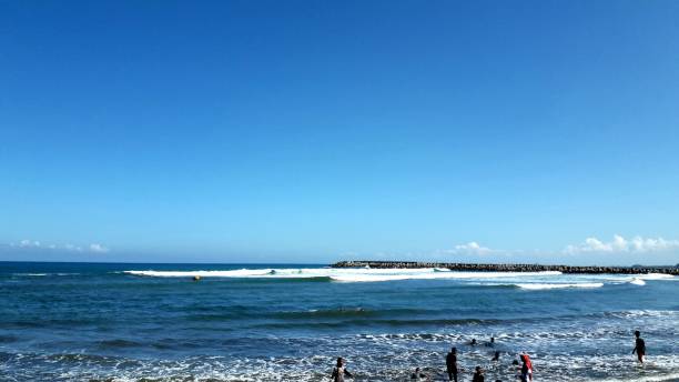 istock Beautiful background of Widara Payung Beach Cilacap Central Java with green hill and blue sky for wallpaper 1503454805
