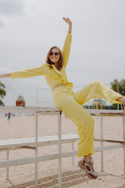 istock Happy young woman on the beach 1503459465