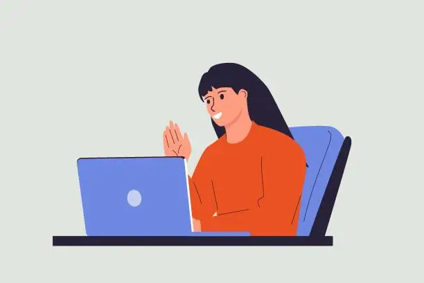 Vector illustration of Woman working with a laptop in her cozy workplace. She waves her hand towards the screen. Joyful delightful workday.