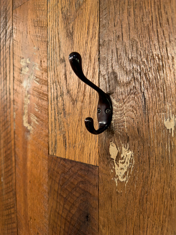 Coat hook on a wooden wall