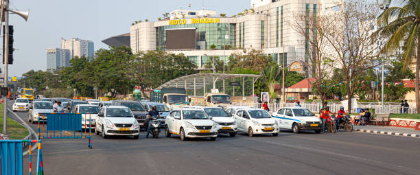 Traffic stopped at lights in front of the HIDCO headquarters in Kolkata, India stock photo