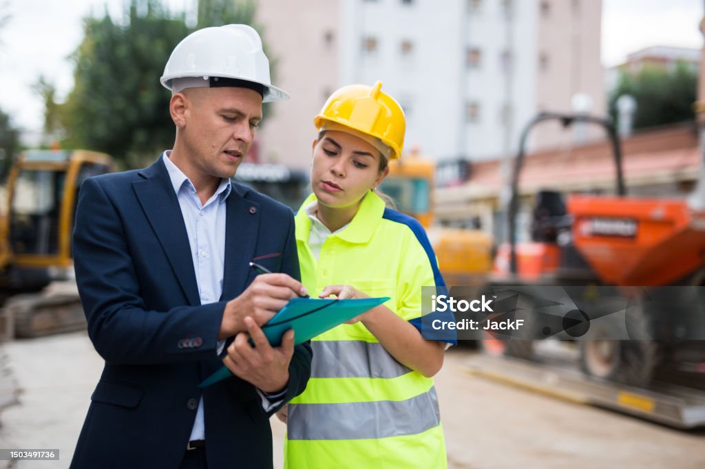 Civil Engineering Contractor Civil Engineers Checking Work Process In Construction Site Stock Photo ...