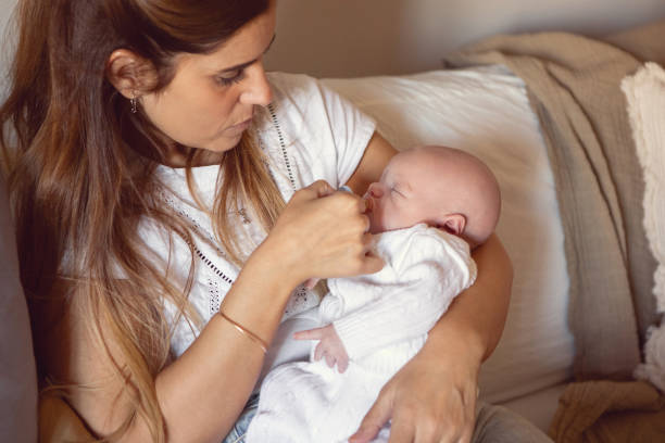 istock Young mother and newborn baby boy 1503495772