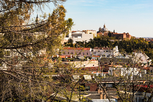 Partial view of the Casa de Campo neighborhood, Moncloa-Aravaca district and the trees of the Case de Campo park, the largest public park in the city of Madrid