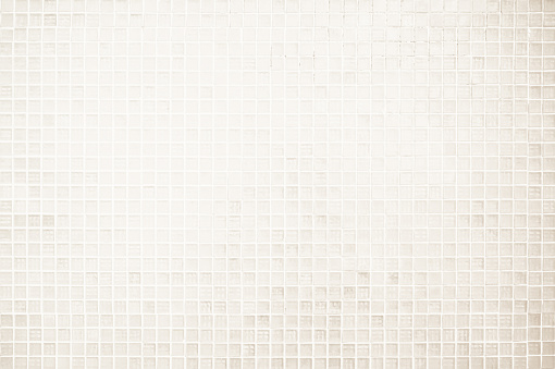 Simple plain white artificial brick wall with textured square blocks, front-view wide horizontal composition