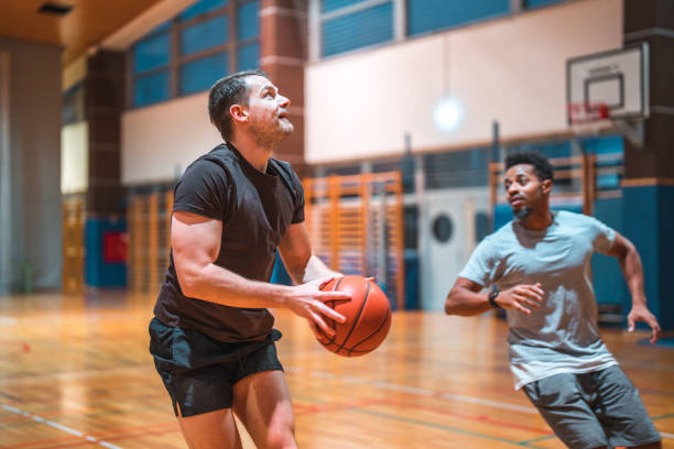 istock Diverse Friends Playing One On One Basketball 1503534884