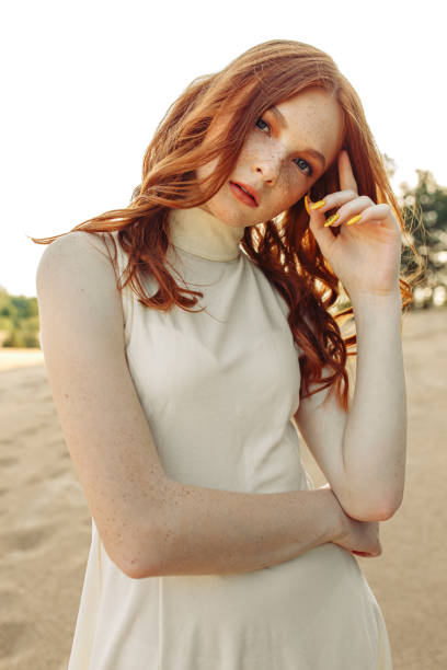 istock Serene redhead woman looking at camera in nature 1503536686