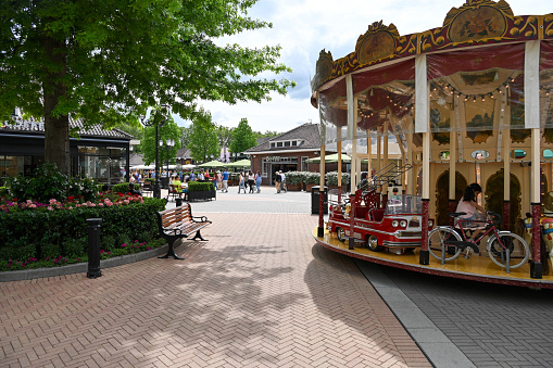 Roermond, Netherlands, June 27, 2023 - Shopping street at Designer Outlet Roermond, a factory outlet center in the Dutch city of Roermond.