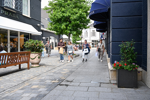 Roermond, Netherlands, June 27, 2023 - Shopping street at Designer Outlet Roermond, a factory outlet center in the Dutch city of Roermond.