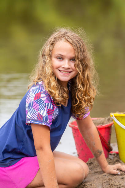 istock Curly Haired Girl At The Beach 1503586864