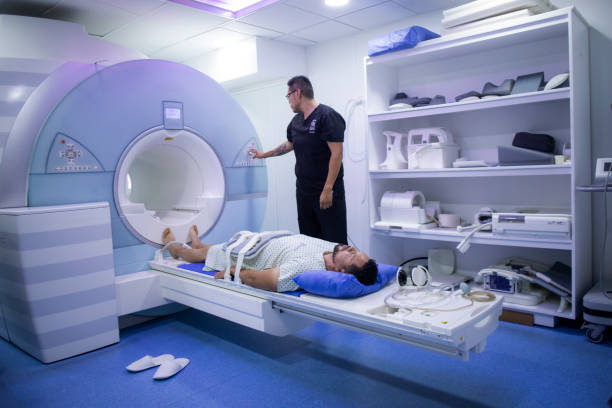istock Man undergoing a MRI scan in a hospital 1503623256