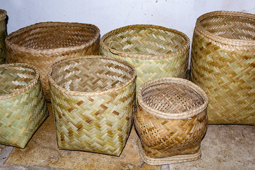 Baskets, made of vegetable fiber, decorated with a bicolor geometric pattern, according to the Amazonian indigenous tradition, from the \