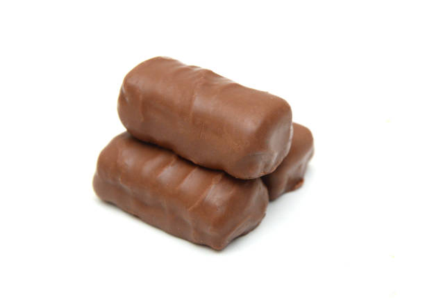 istock Chocolate candies isolated on white background 1503639879