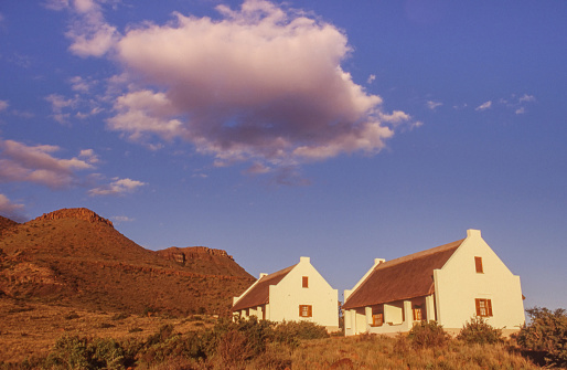 Karoo National Park, South Africa - 20 June 2023: Attractive Cape Dutch style chalets in the Karoo National Park near Beaufort West in the Western Cape Province of South Africa.