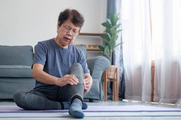 istock Mature female athlete with joint or muscle soreness and problem feeling ache. 1503662038