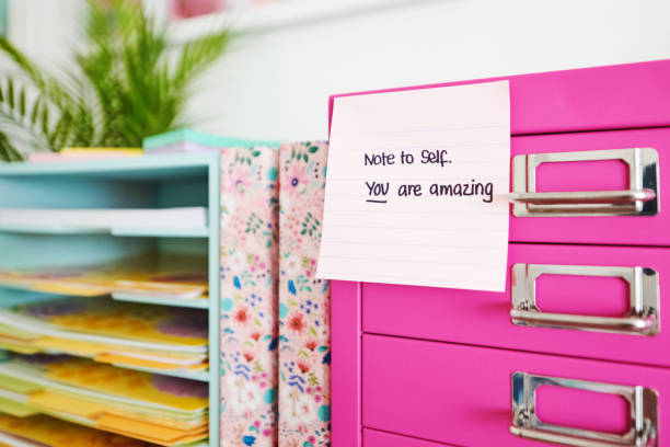 istock Sticky notes on a filing cabinet in a bright modern home office 1503670012