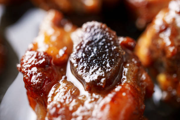 istock delicious fried meat in frying pan 1503694039