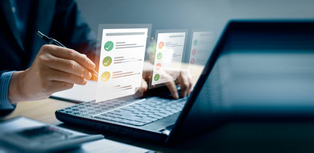 istock Business performance checklist, businessman using laptop doing online checklist survey, Check marks on checklist and Filling online form or answering questions. evaluation, online survey, online exam. 1503698553