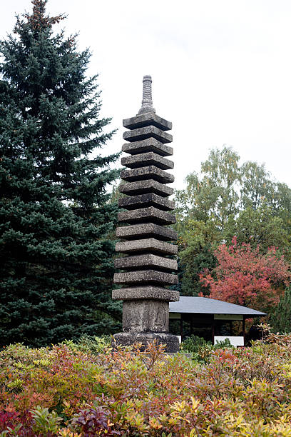 istock Autumn bush and small stone tower 150370020