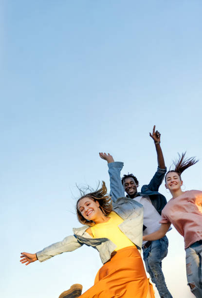 istock Happy multiracial young people jumping 1503703412