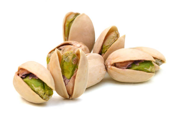 istock Pistachio nuts. Isolated on a white background. 1503705667