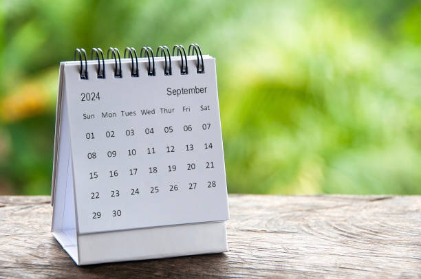 istock September 2024 white table calendar with customizable space for text. Calendar and copy space concept 1503705900