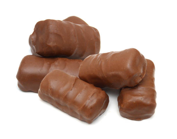 istock Chocolate candies collection. Beautiful Belgian truffles isolated on white background 1503707542