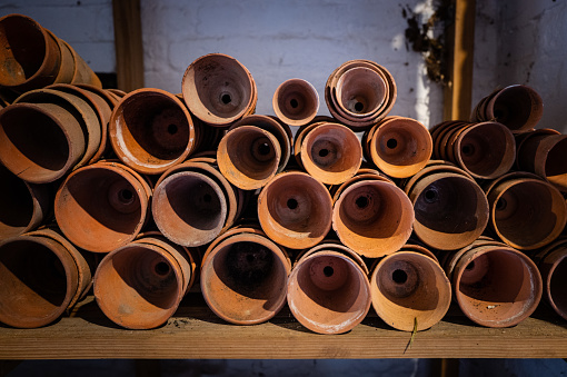terracotta pots in a potting shed