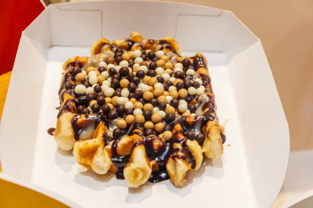 istock Belgian waffle with sweet toppings and chocolate 1503711724