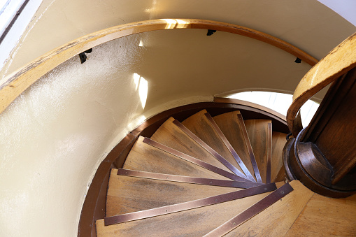 Wooden sprial stair case leading down