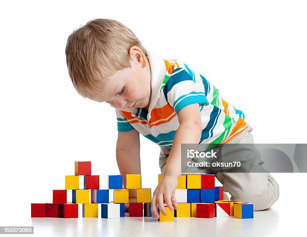 Kid Playing Toy Blocks On White Background Stock Photo - Download Image Now - Activity, Block Shape, Boys