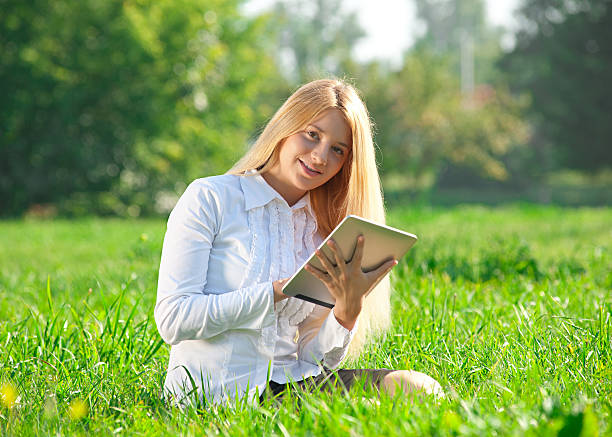 istock Business woman using tablet outdoors 150374181