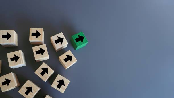 istock Green arrow leads other arrows 1503752195