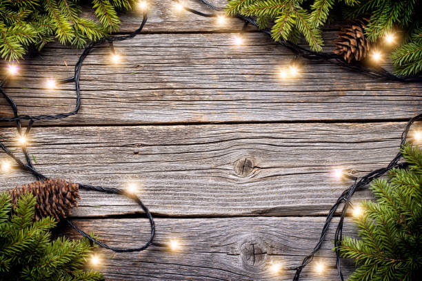 istock Christmas glowing garland and fir tree branches 1503753813