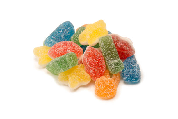 istock Assorted gummy candies isolated on a white background. Top view. 1503757295
