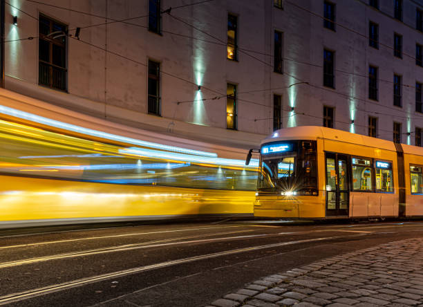 Blurred motion of Berlin Tram at Hackescher Markt at night, Berlin central Hackescher Markt
