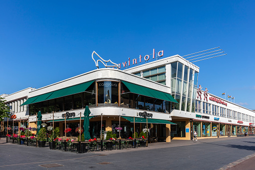 Helsinki, Finland - June 26, 2023: Street view of Helsinki.  Lasipalatsi is a functionalist  building designed in the 1930s.