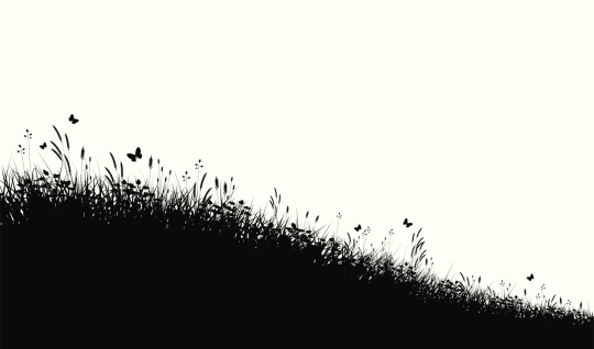 Editable vector silhouette of a grassy meadow with copy space. Hi-res jpeg file included.