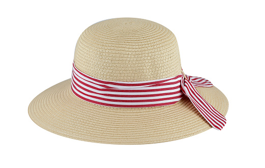 Feminine straw hat with red and white striped ribbon, isolated on white background, cut out, clipping path, studio shot