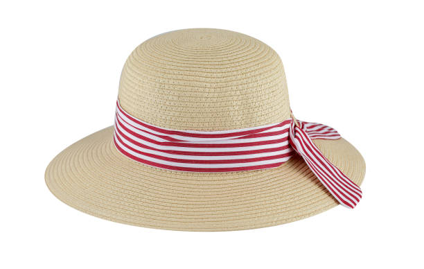 Straw hat with red and white striped ribbon on white background stock photo