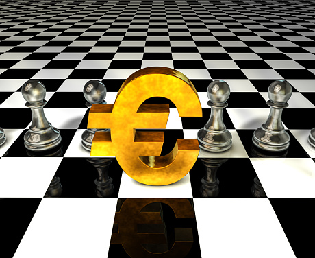 Euro symbol and chess pieces