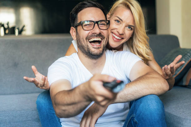 istock Young couple watching TV 1503816952