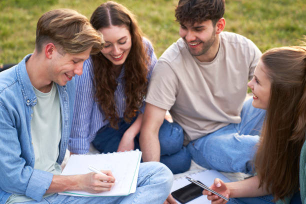 istock Group of caucasian students studying outside the university campus 1503837274