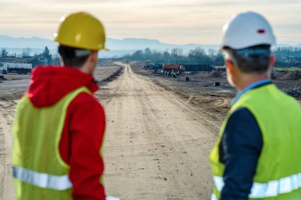 istock Engineer and investor on a road construction site 1503851416